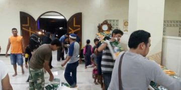 Suasana Persiapan Distribusi Beras dan Uang Tunai