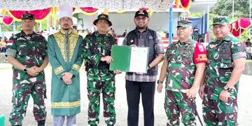 Bupati Bassam Menerima BA Penyerahan Hasil TMMD dari Dandim 1509 Labuha
