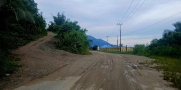 Badan Jalan Amasing Kali Tertimbun Tanah Akibat Aktivitas Galian C